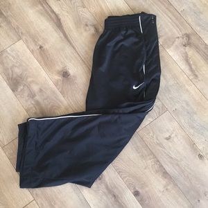 SOLD.  Nike tear away pants